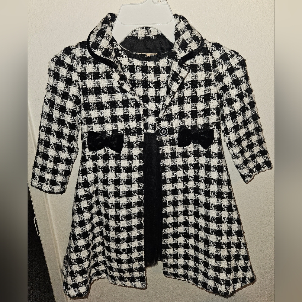 Cute black and white dress for toddler girl. Comes with jacket/coat.